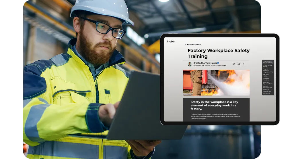 A worker with a beard, wearing a white hard hat, safety glasses, and a high-visibility yellow jacket, uses a laptop in an industrial environment. Overlaid on the right is a tablet displaying a "Factory Workplace Safety Training" course created by Tom Harris for IronGate Industries, featuring a header image of a fire extinguisher in use.
