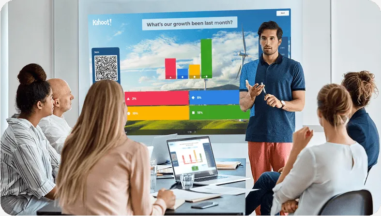Male presenting to his colleagues using Kahoot!