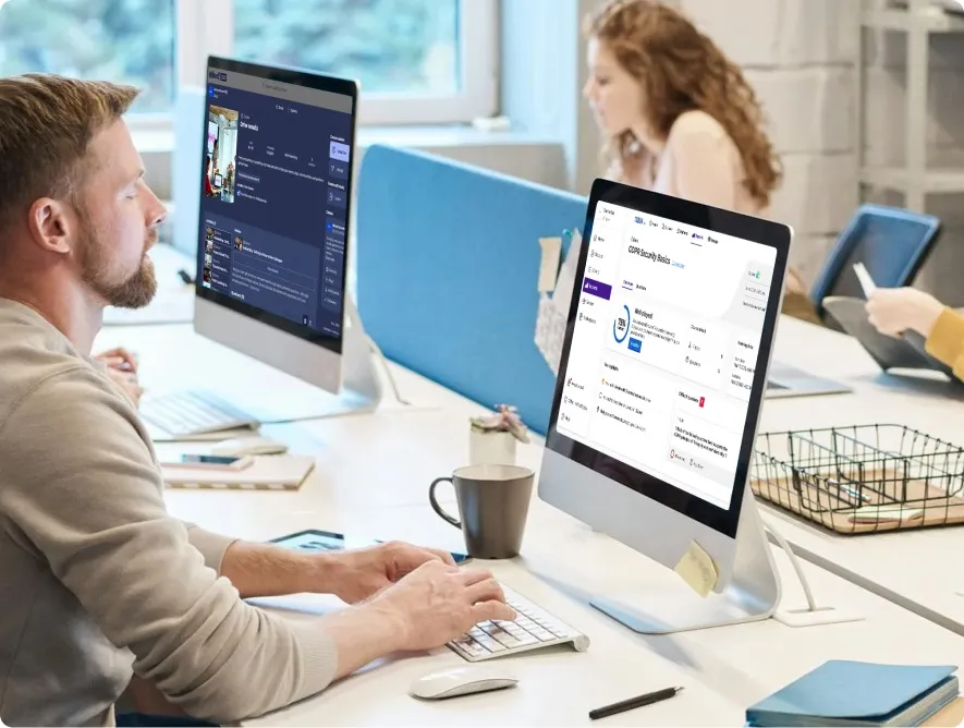 A man in a modern office works on a computer showing a Kahoot! "GDPR Security Basics" report.