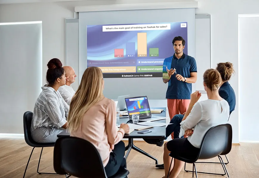 Male presenter using Kahoot! to conduct a Sales presentation
