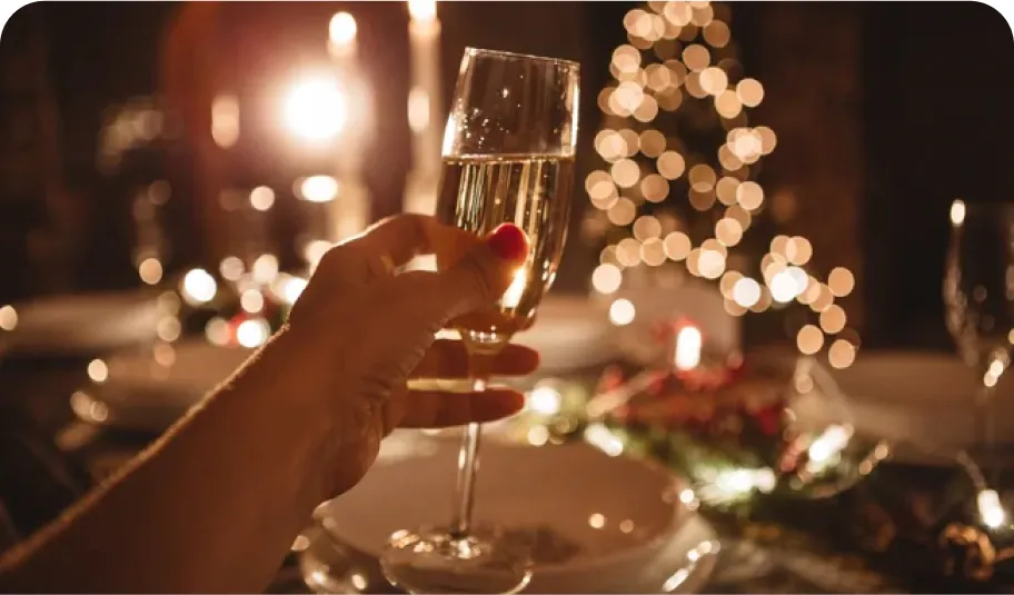 Hand holding a glass